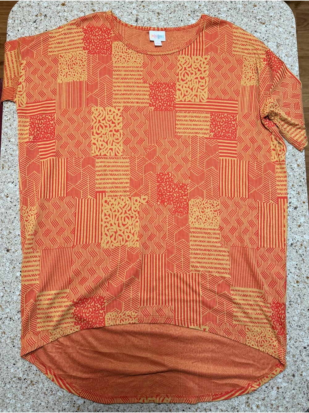 LuLaRoe Orange and Gold Geometric Patchwork Short Sleeve Top